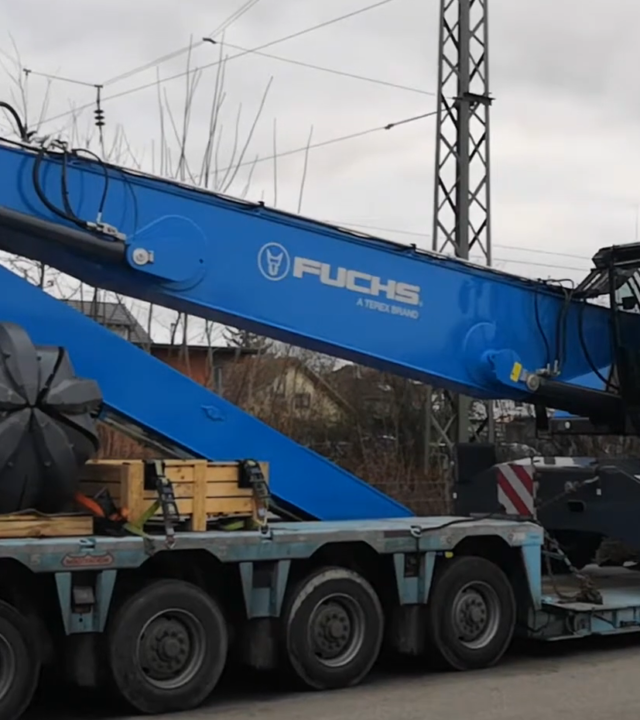 Transport koparki kołowej Fuchs MHL 340 z Austrii do Polski